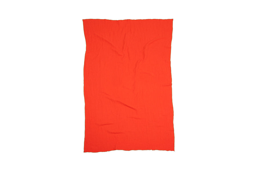 Evy Throws/Cushions by Brita, showing evy throws/cushions in tomato evy woven recycled cotton.