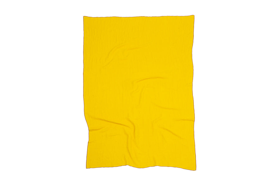Evy Throws/Cushions by Brita, showing evy throws/cushions in lemon evy woven recycled cotton.