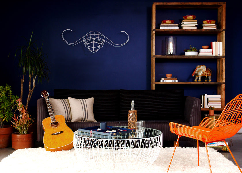 Farmhouse Lounge Chair by Bend, showing farmhouse lounge chair with sofa & table in live shot.