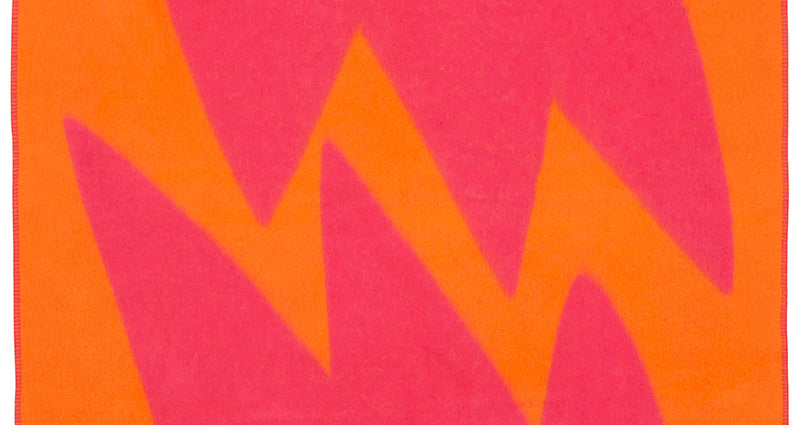 Flash Woolen Blanket by Brita, showing closeup view of flash woolen blanket in orange flash woolen blanket.