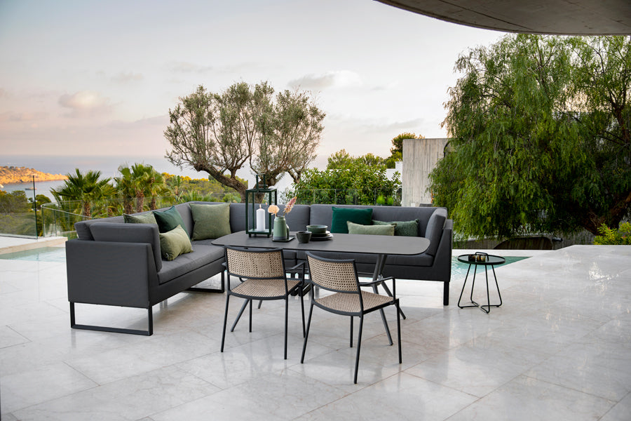 Flex 2-Seater Sofa Module by Cane-Line, showing flex 2-seater sofa modules in live shot.