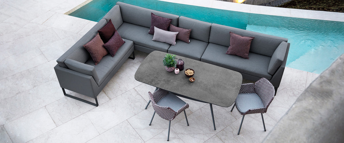 Flex 2-Seater Sofa Module by Cane-Line, showing flex 2-seater sofa modules in live shot.