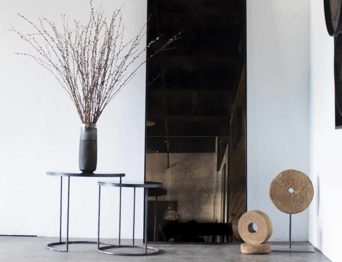 Floor Mirror by Ethnicraft, showing front view of bronze floor mirror in live shot.