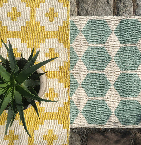 Flower Soft Plastic Rug by Brita, showing of flower soft plastic rug in the live shot.