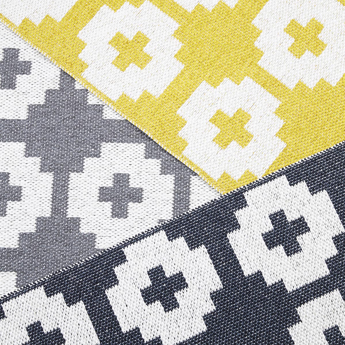 Flower Soft Plastic Rug by Brita, showing closeup view of flower soft plastic rug.