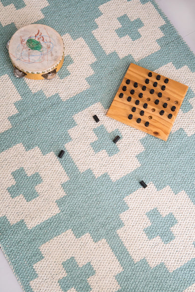 Flower Soft Plastic Rug by Brita, showing closeup view of flower soft plastic rug.