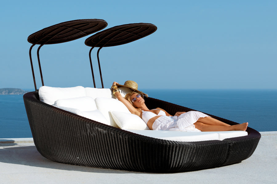 Focus Scatter Cushion by Cane-Line, showing focus scatter cushions in live shot.