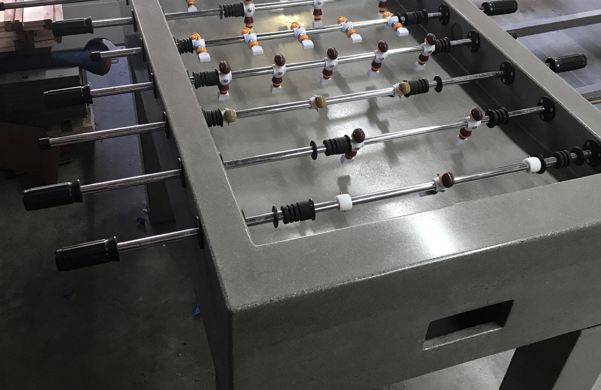 James De Wulf Foosball Table by De Wulf, showing closeup view of foosball table in live shot.