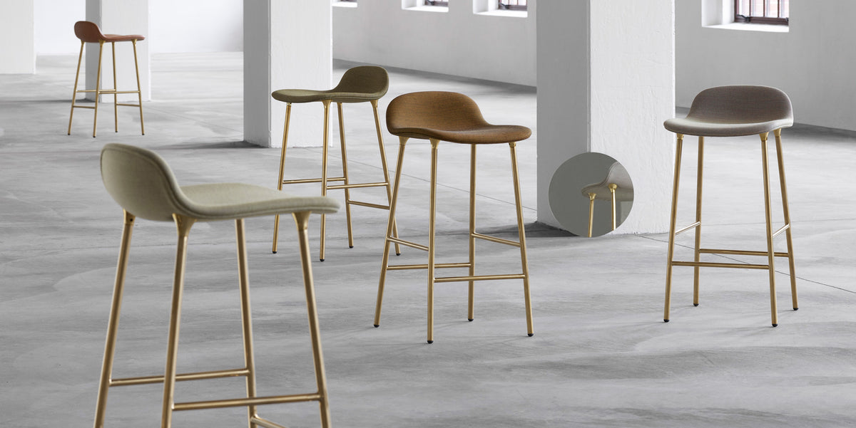 Form 30" High Barstool by Normann Copenhagen, showing form 30" high batsools in live shot.