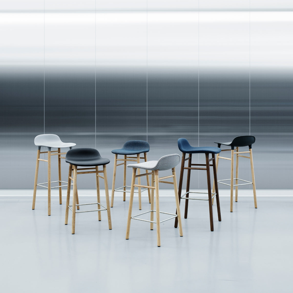 Form 30" High Barstool by Normann Copenhagen, showing form 30" high batsools in live shot.