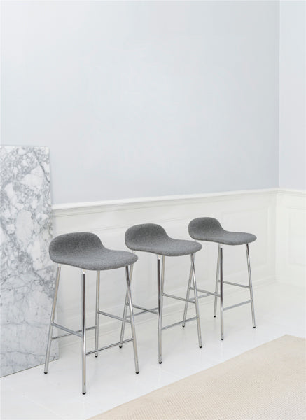 Form 30" High Barstool by Normann Copenhagen, showing form 30" high batsools in live shot.
