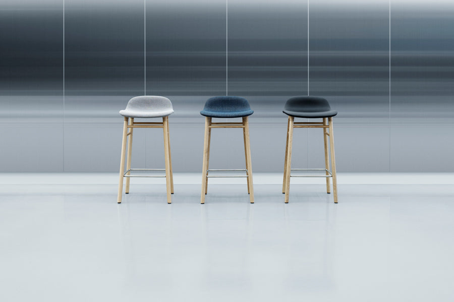 Form 30" High Barstool by Normann Copenhagen, showing form 30" high batsools in live shot.