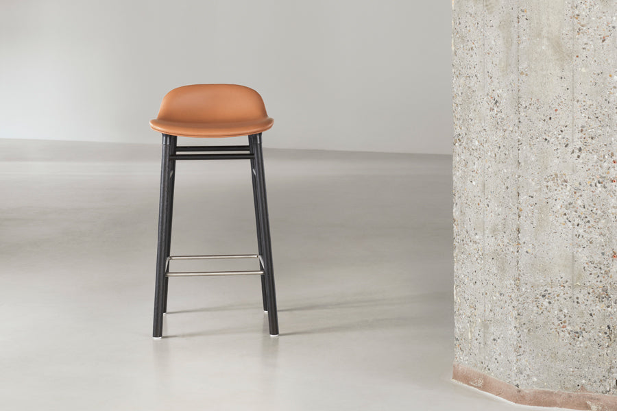 Form 30" High Barstool by Normann Copenhagen, showing form 30" high batsools in live shot.