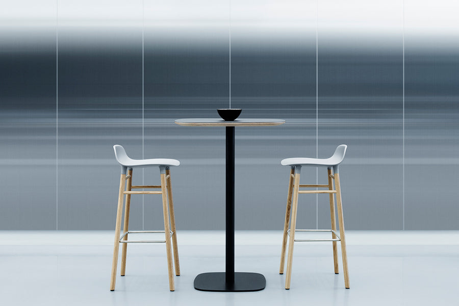 Form 30" High Barstool by Normann Copenhagen, showing form 30" high batsools in live shot.