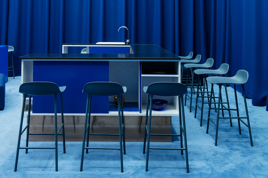 Form 30" High Barstool by Normann Copenhagen, showing form 30" high batsools in live shot.