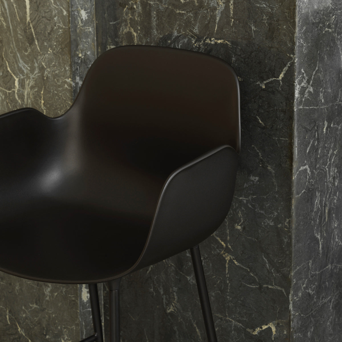 Form 39" High Bar Armchair by Normann Copenhagen, showing closeup view of form 39" bar armchair in live shot.