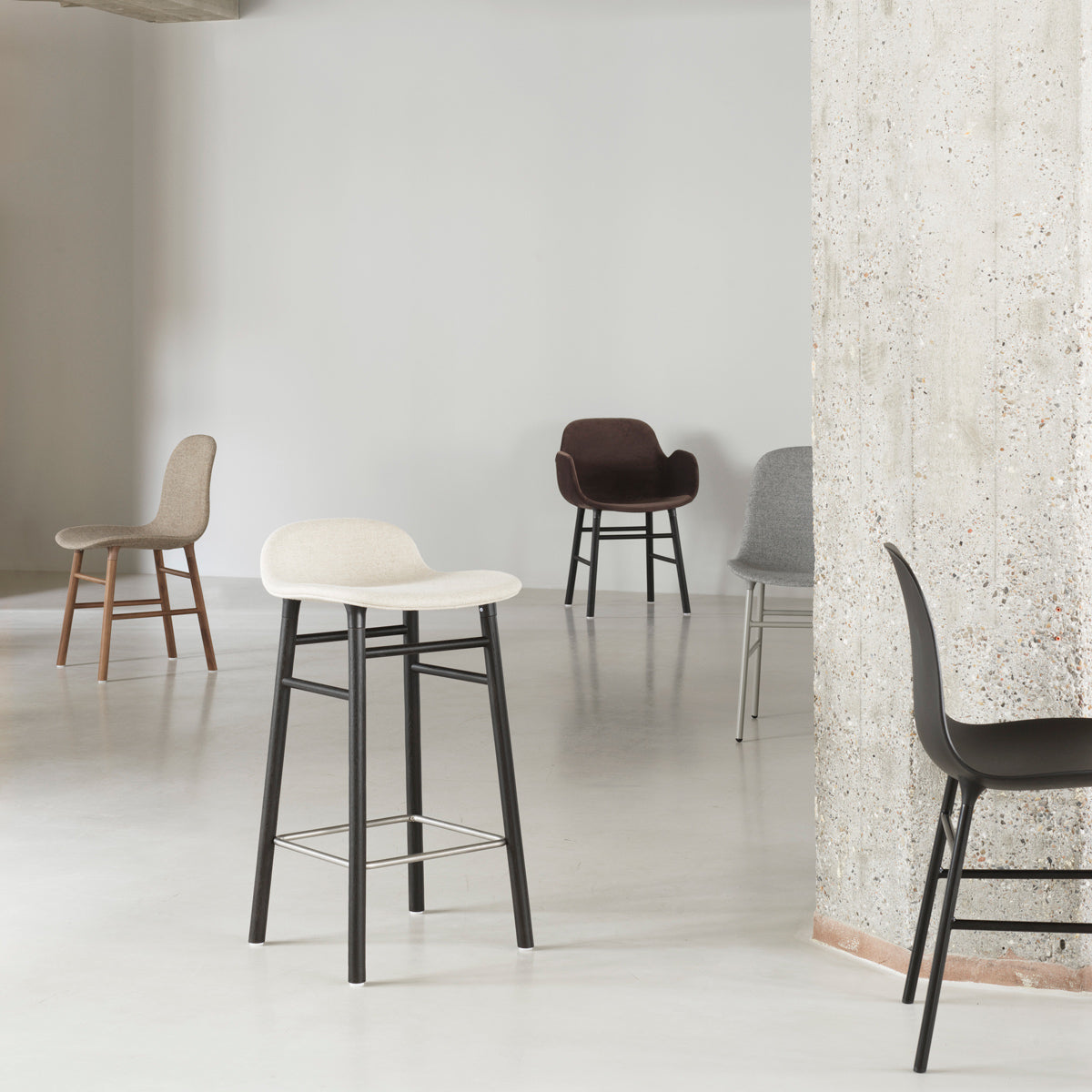 Form 39" High Bar Chair by Normann Copenhagen, showing form 39" high bar chair in live shot.