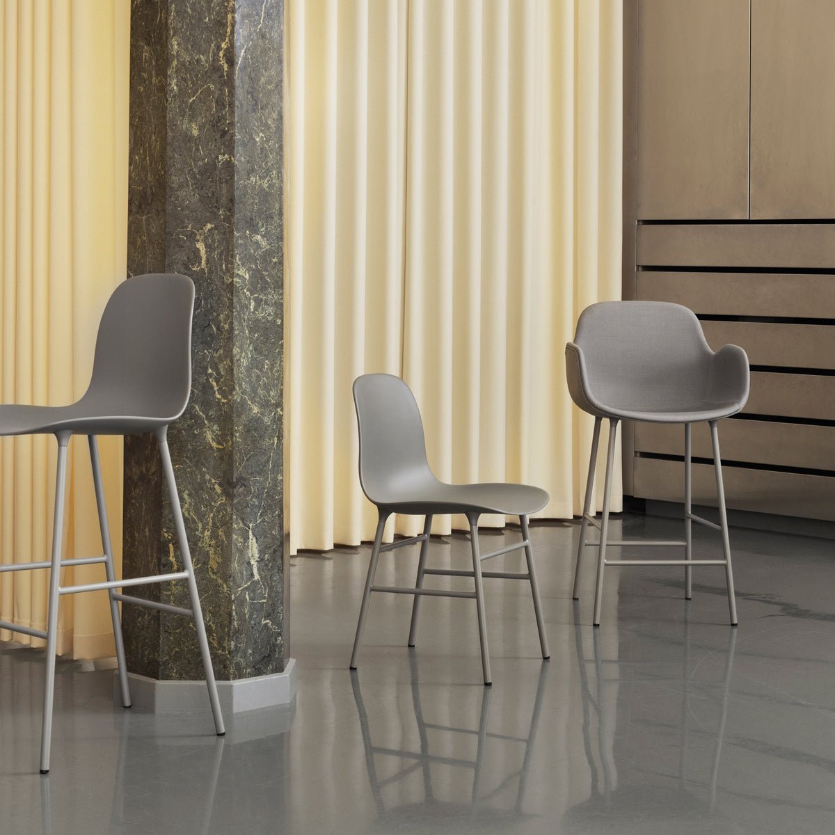 Form 39" High Bar Chair by Normann Copenhagen, showing form 39" high bar chair in live shot.
