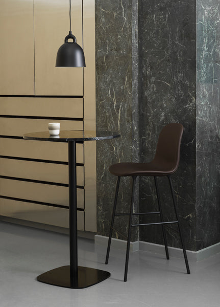 Form 39" High Bar Chair by Normann Copenhagen, showing form 39" high bar chair in live shot.