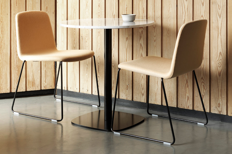 Form Cafe Table by Normann Copenhagen, showing form cafe table in live shot.