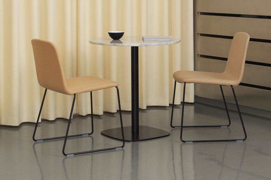 Form Cafe Table by Normann Copenhagen, showing form cafe table in live shot.