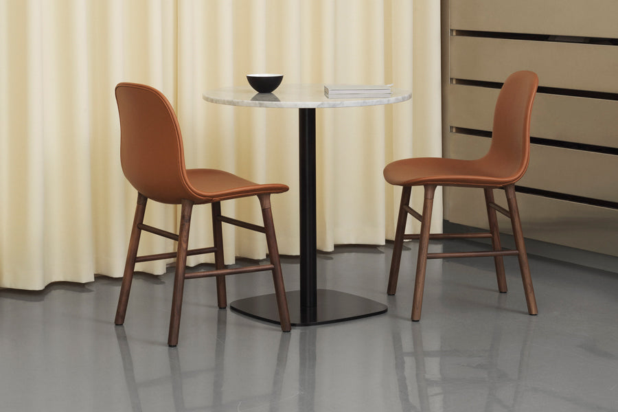Form Cafe Table by Normann Copenhagen, showing form cafe table in live shot.