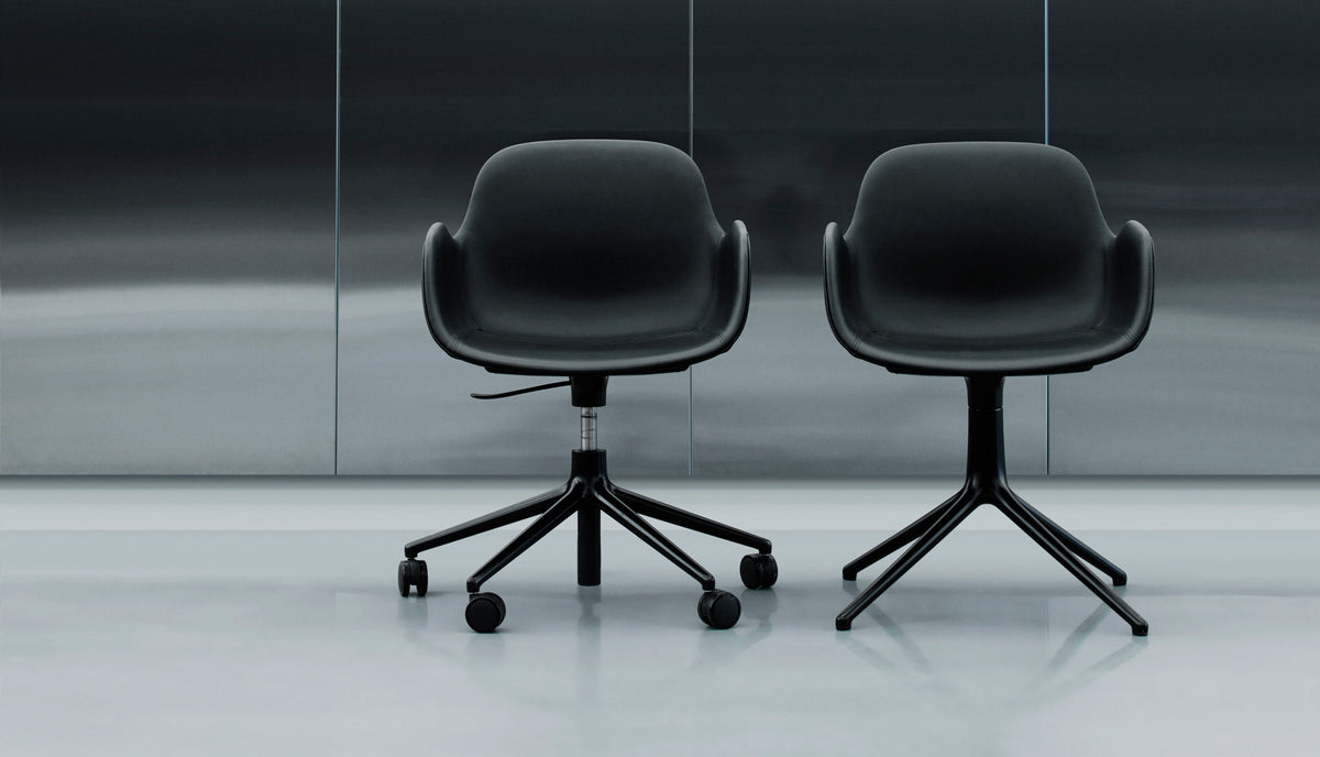 Form Swivel Chair by Normann Copenhagen, showing form swivel chairs in live shot.