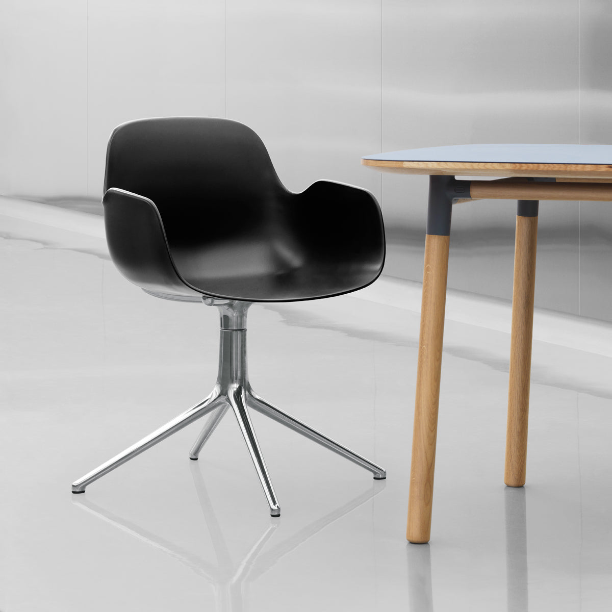 Form Swivel Chair by Normann Copenhagen, showing form swivel chair in live shot.
