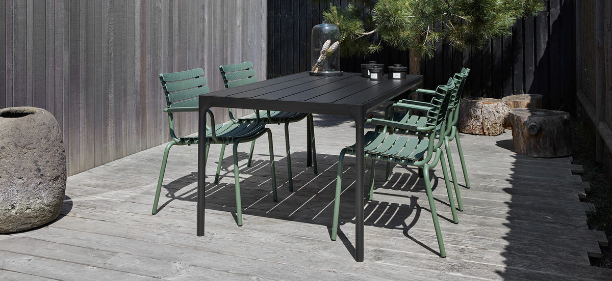 Four Outdoor Dining Table by Houe, showing four outdoor dining table with chairs in live shot.