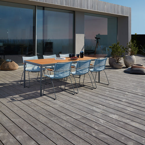 Four Outdoor Dining Table by Houe, showing four outdoor dining table with chairs in live shot.
