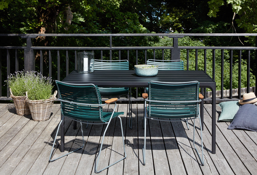 Four Outdoor Dining Table by Houe, showing four outdoor dining table with chairs in live shot.