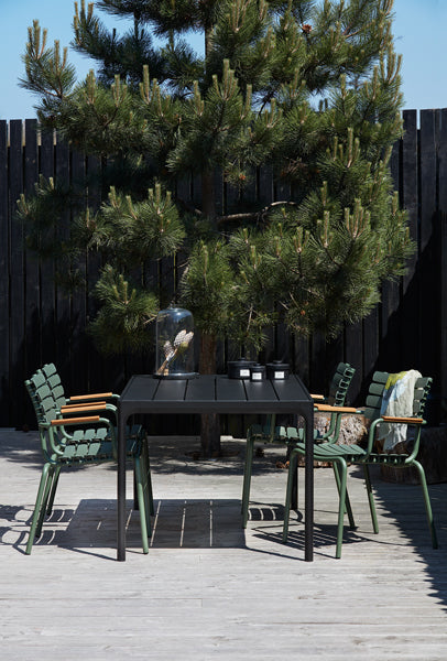 Four Outdoor Dining Table by Houe, showing four outdoor dining table with chairs in live shot.
