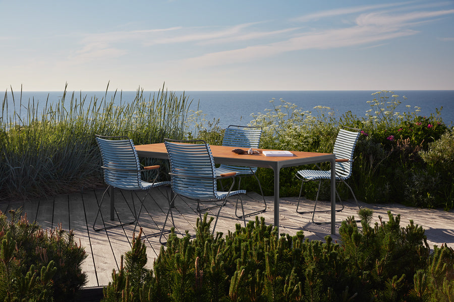 Four Outdoor Dining Table by Houe, showing four outdoor dining table with chairs in live shot.