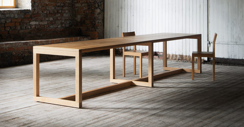 Frame Dining Table by Nikari, showing frame dining table in live shot.