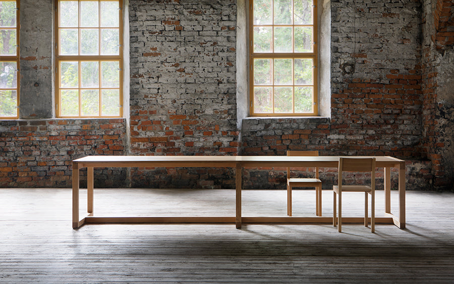 Frame Dining Table by Nikari, showing frame dining table in live shot.