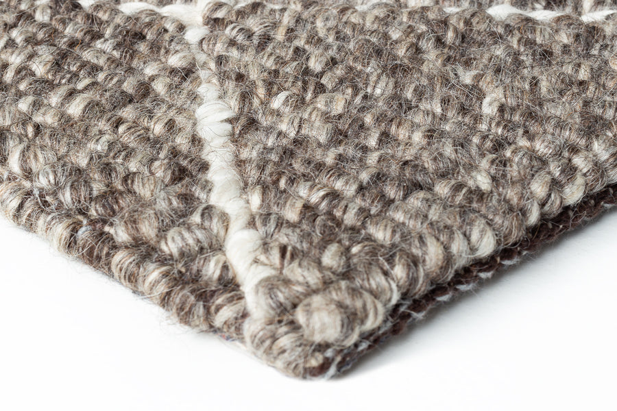 Framework 229.001.900 Hand Woven Rug by Ligne Pure, showing closeup view of framework hand wovn rug.