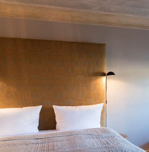 Funiculi A Wall Lamp by Marset, showing funiculi a wall lamp in live shot.