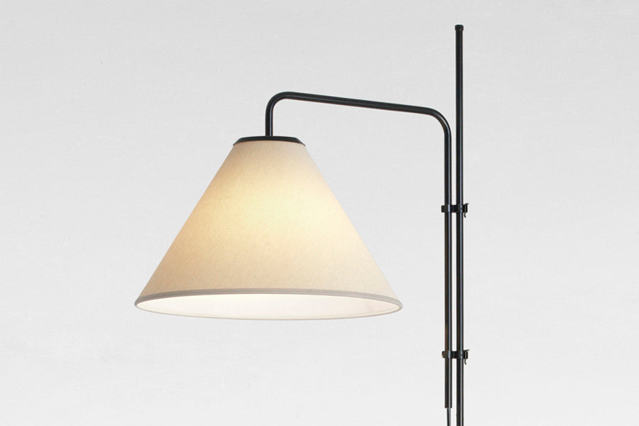 Funiculi Fabric Floor Lamp by Marset, showing closeup view of funiculi fabric floor lamp in sand fabric shade.