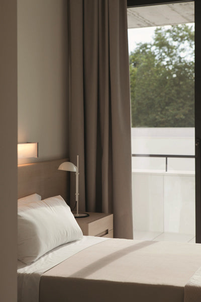 Funiculi S Table Lamp by Marset, showing funiculi s table lamp in live shot.