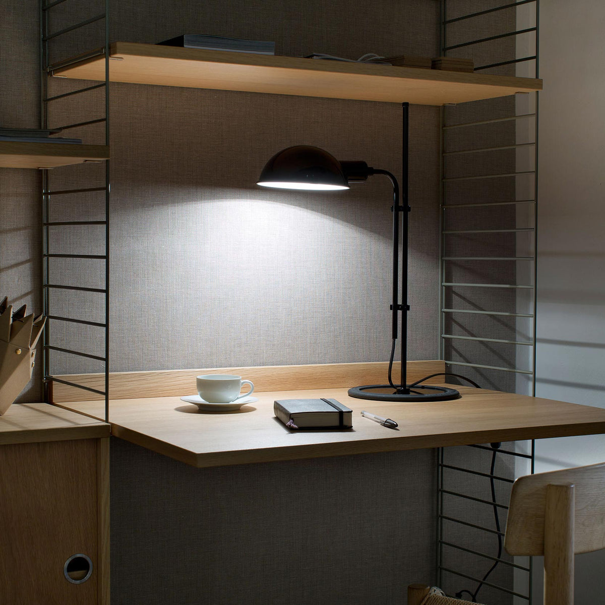 Funiculi S Table Lamp by Marset, showing funiculi s table lamp in live shot.