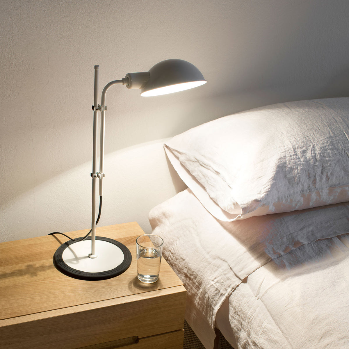 Funiculi S Table Lamp by Marset, showing funiculi s table lamp in live shot.