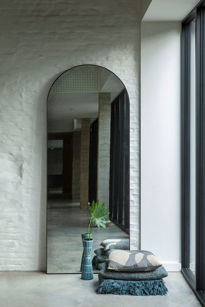 Gate Floor Mirror by Ethnicraft, showing front view of gate floor mirror in live shot.