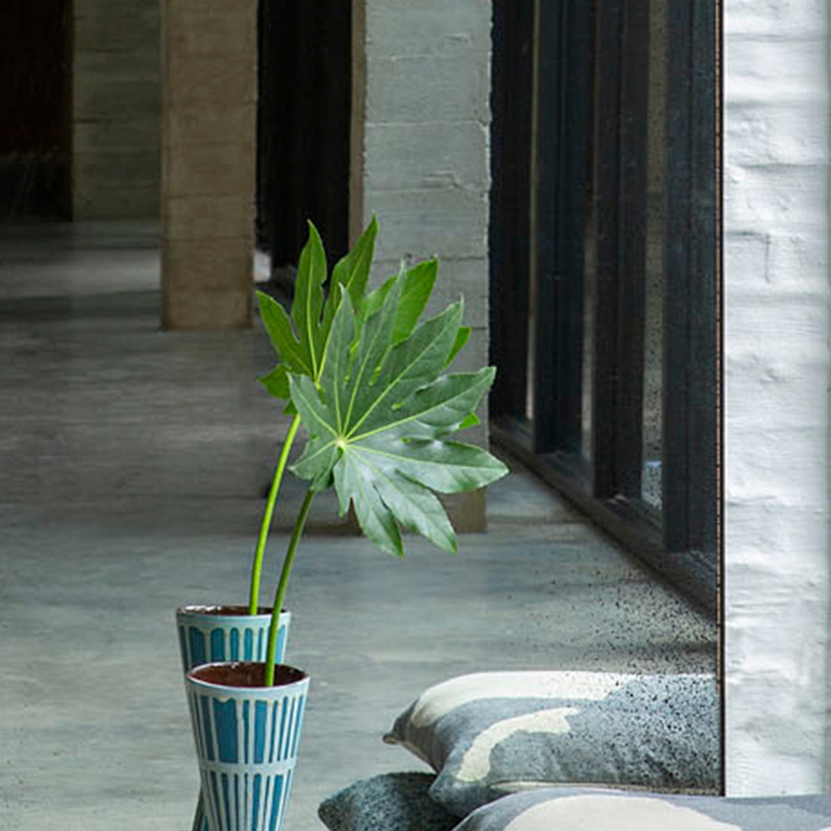 Gate Floor Mirror by Ethnicraft, showing front view of gate floor mirror in live shot.