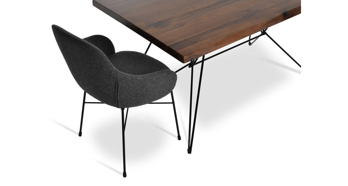 Gazel Arm Cross Chair by SohoConcept, showing arm cross chair with table.