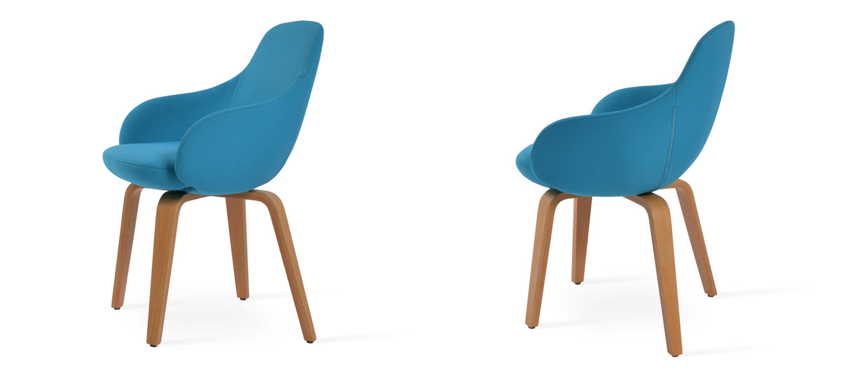 Gazel Arm Plywood Chair by SohoConcept, showing two arm plywood chairs in camira era turquoise fabric with natural finish base.
