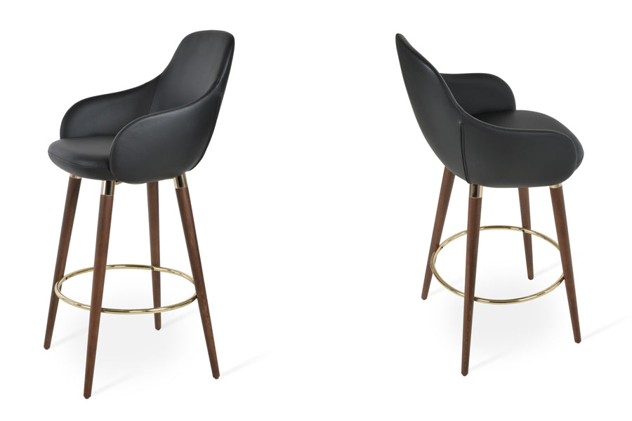 Gazel Arm Wood Stools by SohoConcept, showing two stools in black leatherette with beech wood walnut base.
