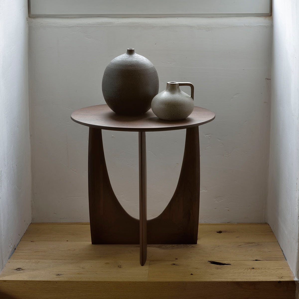 Geometric Side Table by Ethnicraft, showing geometric side table in live shot.