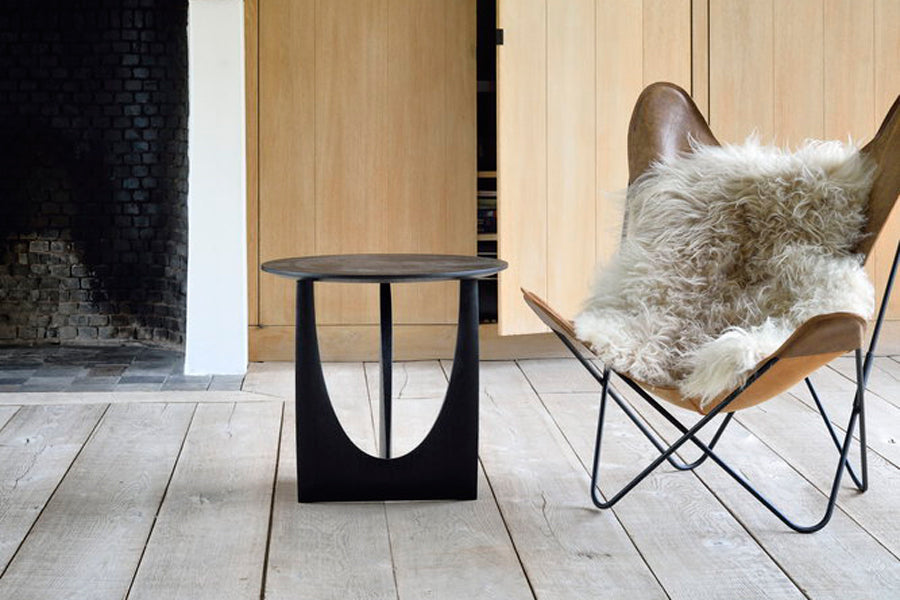 Geometric Side Table by Ethnicraft, showing geometric side table in live shot.