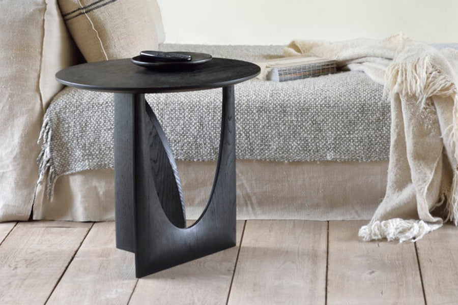 Geometric Side Table by Ethnicraft, showing geometric side table in live shot.