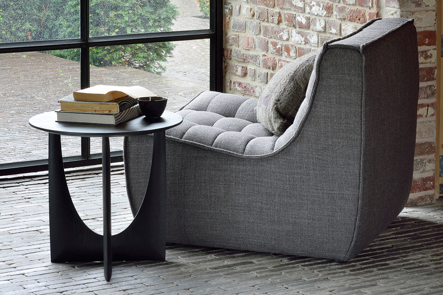 Geometric Side Table by Ethnicraft, showing geometric side table in live shot.